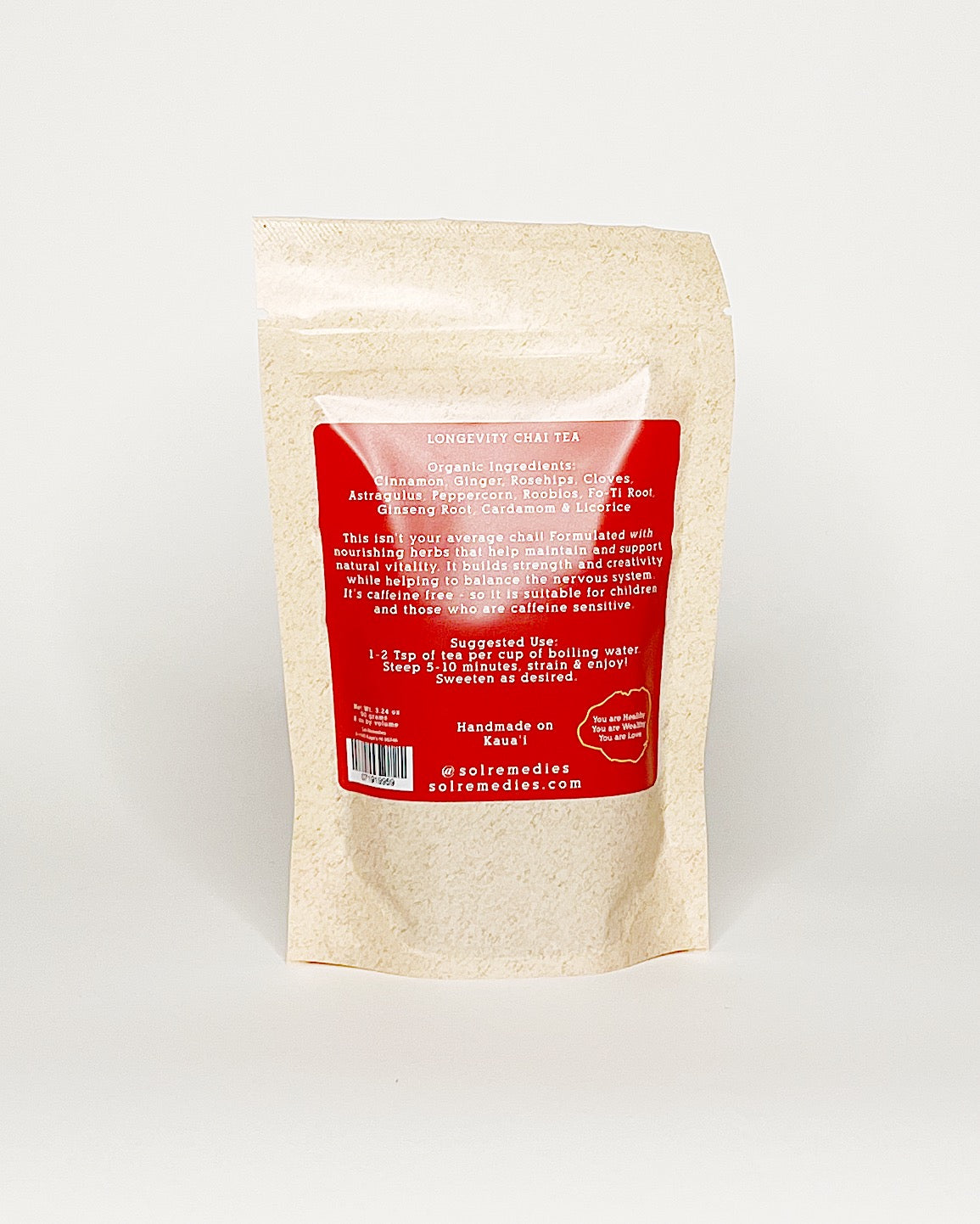 Beige stand-up pouch of ‘Sol Remedies Longevity Chai’ tea, back of bag with ingredient list. White background