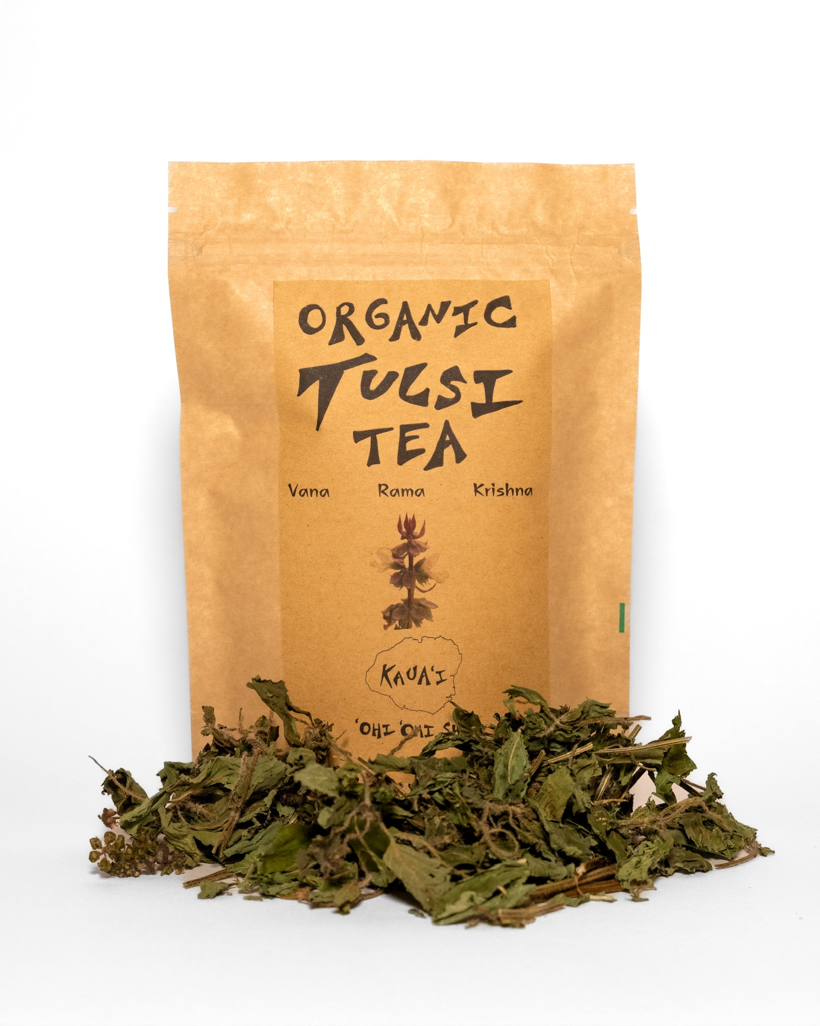 Brown kraft pouch labeled “Organic Tulsi Tea” with an illustration of the tulsi plant, listing Vana, Rama, and Krishna varieties, from ‘Ohi ‘Ohi Shop on Kaua‘i